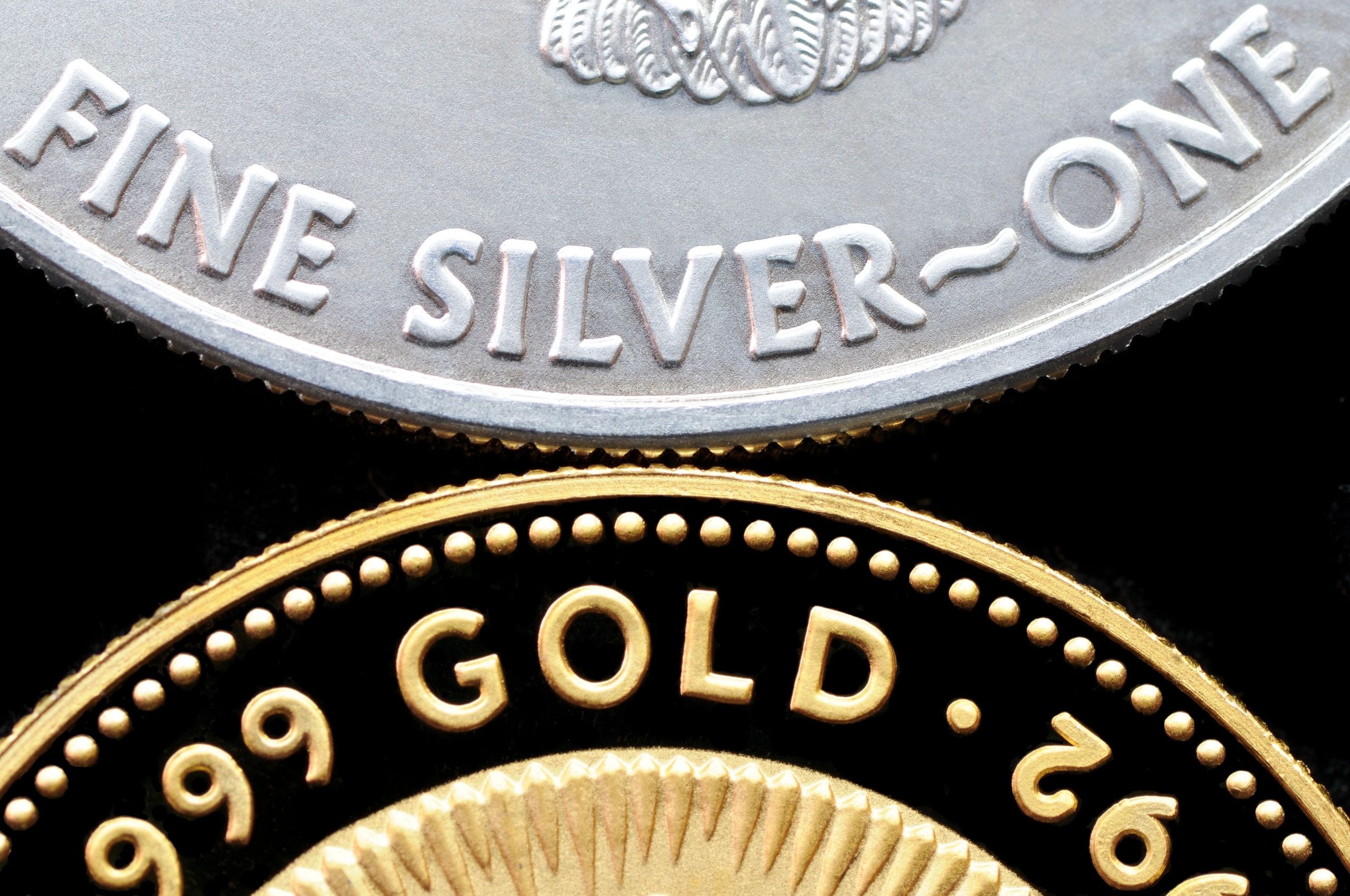Gold and silver coins arranged for a premium presentation